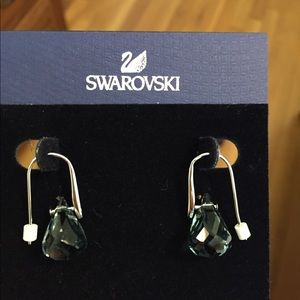 Swarovski earrings.